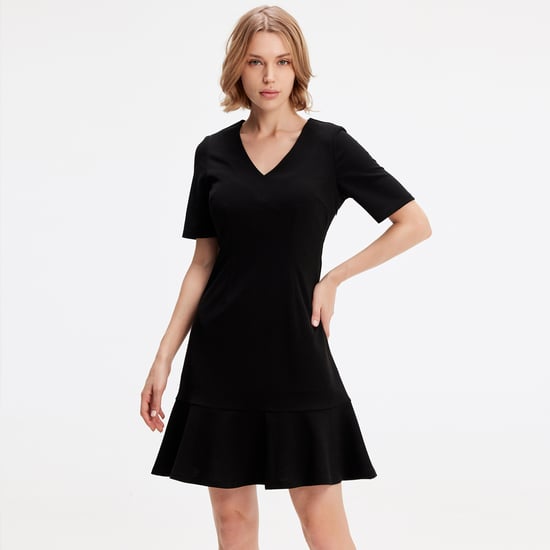 Minimalistische trapeze jerseyjurk - Image 1