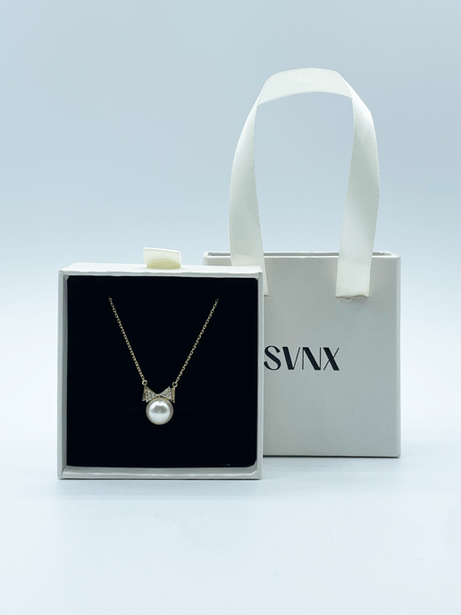 Pearl Bow Tie Necklace in Gold