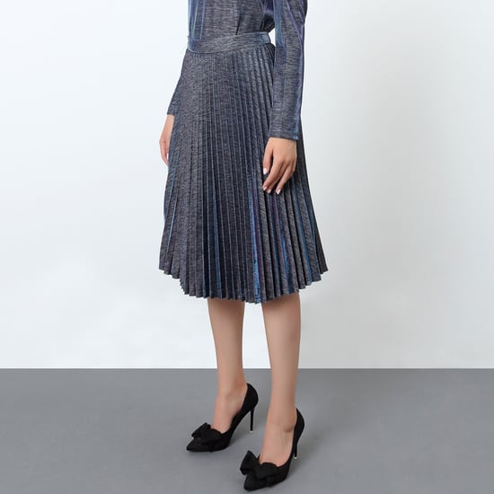 Skimrande kjol med solpleats - Image 4