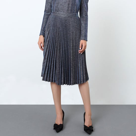 Skimrande kjol med solpleats - Image 5