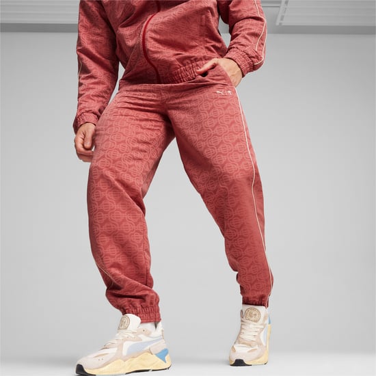 PUMA X Palm Tree Mens Crew T7 All-Over Print Pants - Image 1