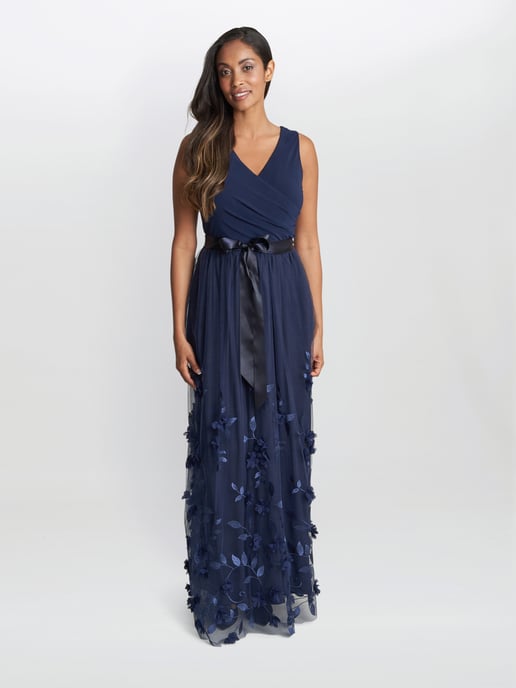 Olyssia Long Sleeveless Dress With Surplice Neckline , 3D Floral Skirt.