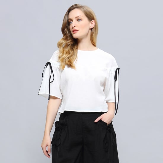 Tulpanärmad crop top - Image 1