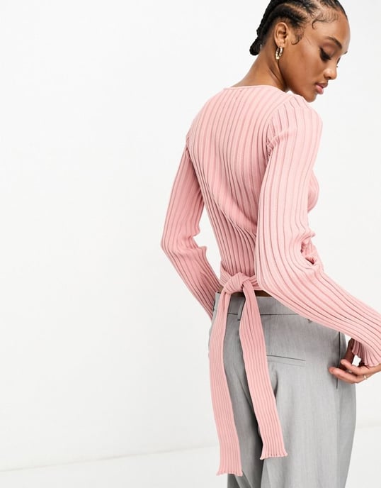 ASOS DESIGN Tall knitted crop top with tie back and flared sleeve in pink