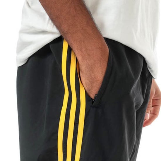 Men's adidas Originals Tourney Warm Up Track Pants in Black - Image 5