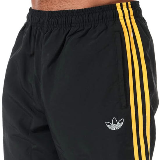 Men's adidas Originals Tourney Warm Up Track Pants in Black - Image 6