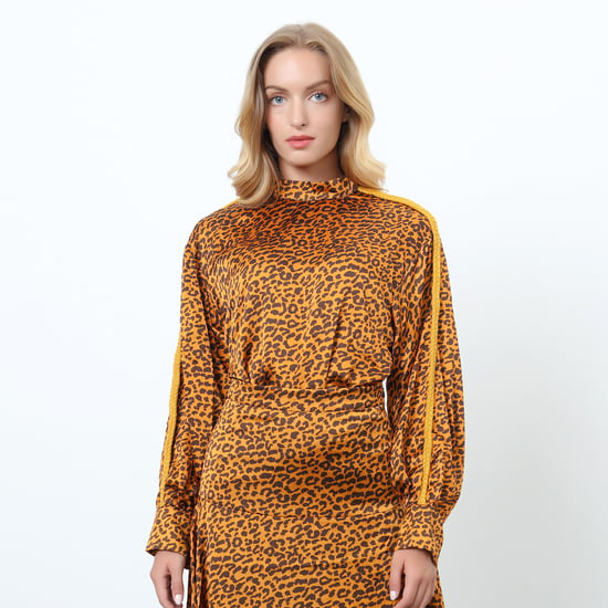 Blus i leopardmönster och ärmar med tofsar - Image 1