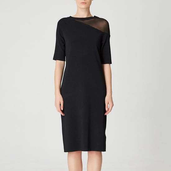 Minimalistisk jerseyklänning med asymmetrisk skärning - Image 5