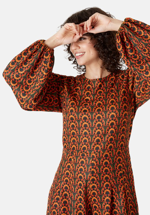 Bambi Tile Print Jersey Playsuit in Orange and Green