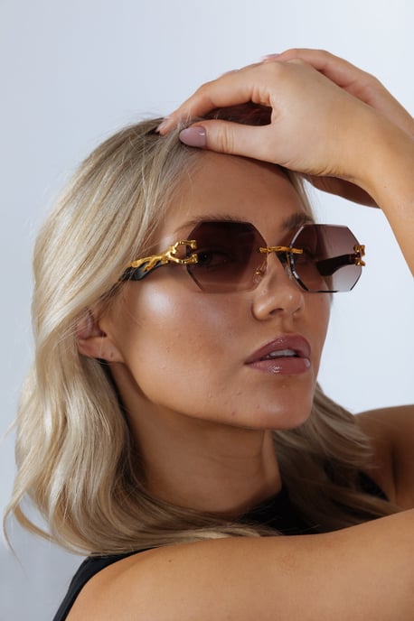 Rimless Oval Geometric Sunglasses in Gold Brown - Image 1