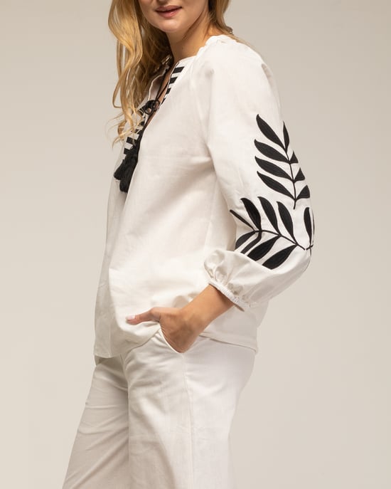 Set van broek en top met borduursel op de mouwen - Image 3