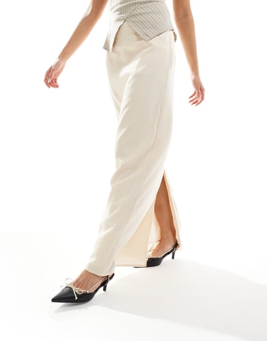 NA-KD x Laura Jane Stone maxi skirt with front pockets and back split detail in beige-Neutral - Image 1