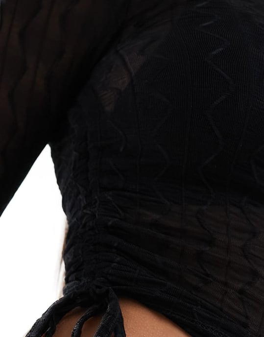 ASOS DESIGN sheer textured long sleeve ruched side top in black - Image 2