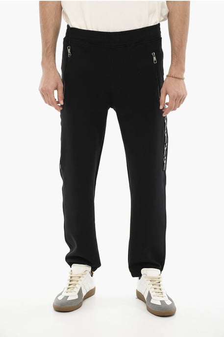 Skinny Fit Joggers with Side Thunderbolts Print in Black - Image 1