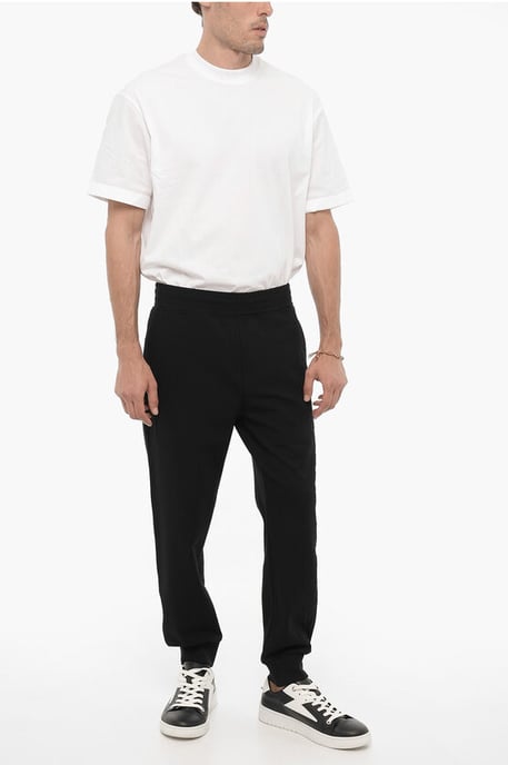 Svarta mjukisbyxor med smal passform och broderier - Image 4