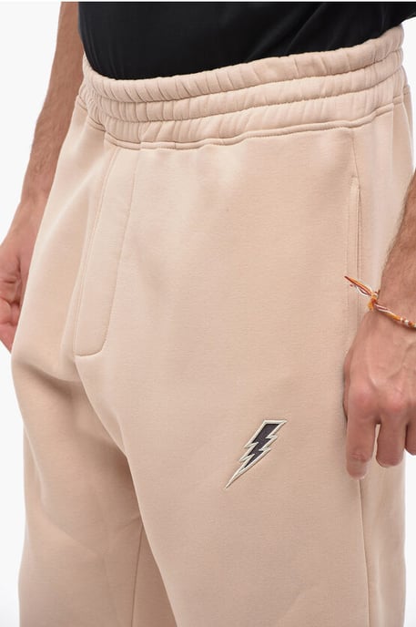 Embroidered BOLT Joggers with Zip at Cuffs in Beige - Image 3