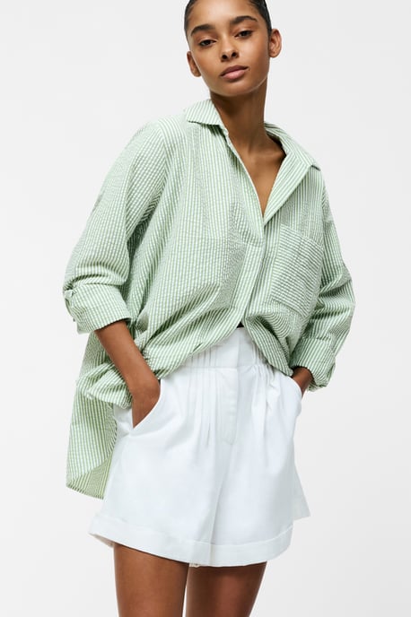 White Cotton Blend Ruffled Loose Pleated Shorts - Image 1