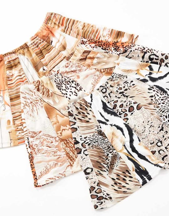 Reclaimed Vintage Revived x Glass Onion festival mini skirt in mixed print - Image 2