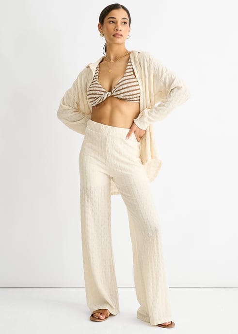 Beige Textured Elasticated Waist Flared Trousers - Image 1