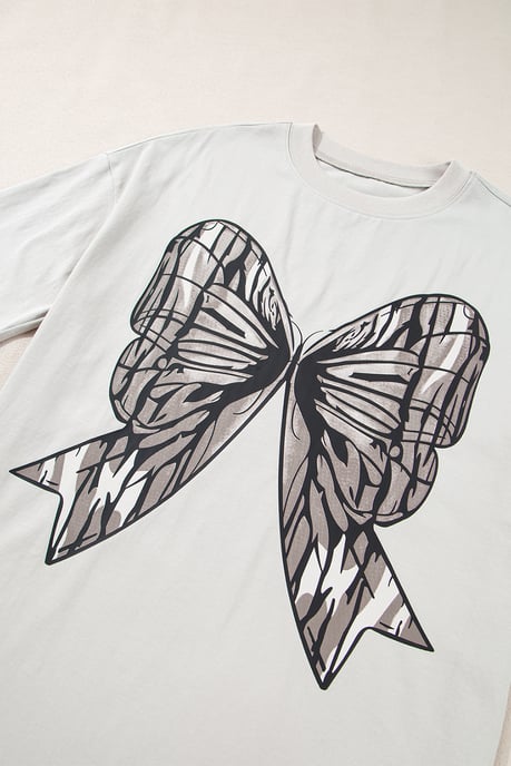 Casual Oversized T-shirt met Grote Strik Bedrukking en Vallen Schouders - Image 5
