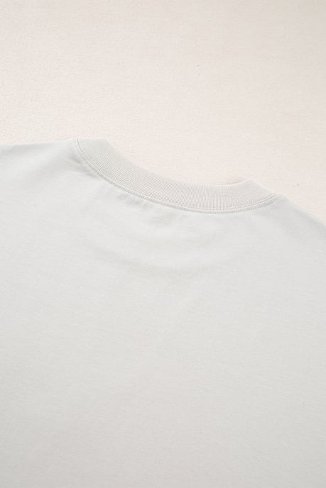 Casual Oversized T-shirt met Grote Strik Bedrukking en Vallen Schouders - Image 6