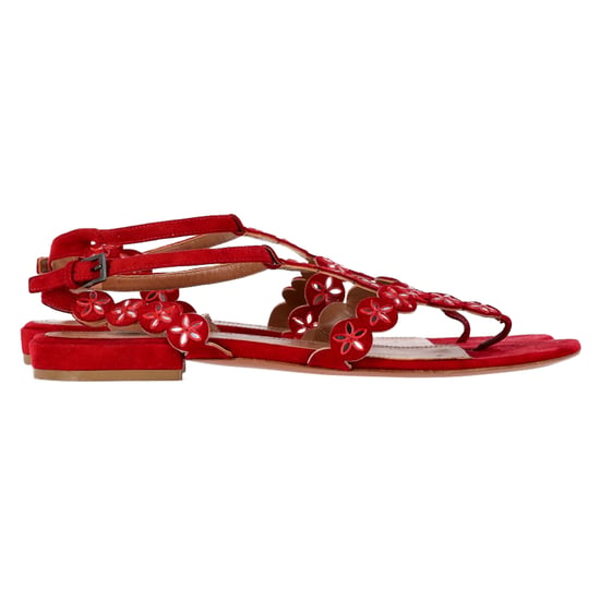 Alaïa Flower Lasercut Ankle Strap Flat Sandals in Red Suede - Image 1