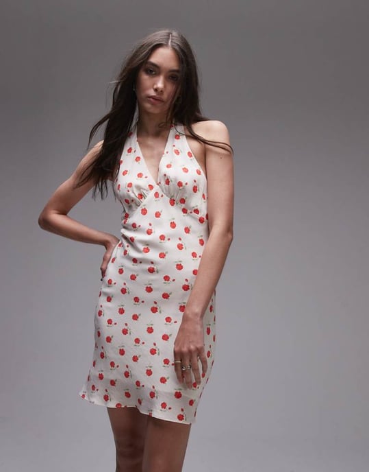 Topshop halterneck flippy mini dress in ivory rose print - Image 1