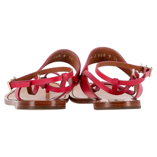 Valentino Garavani Flat Sandalen met T-knop en Enkelband in Roze Leer - Image 5