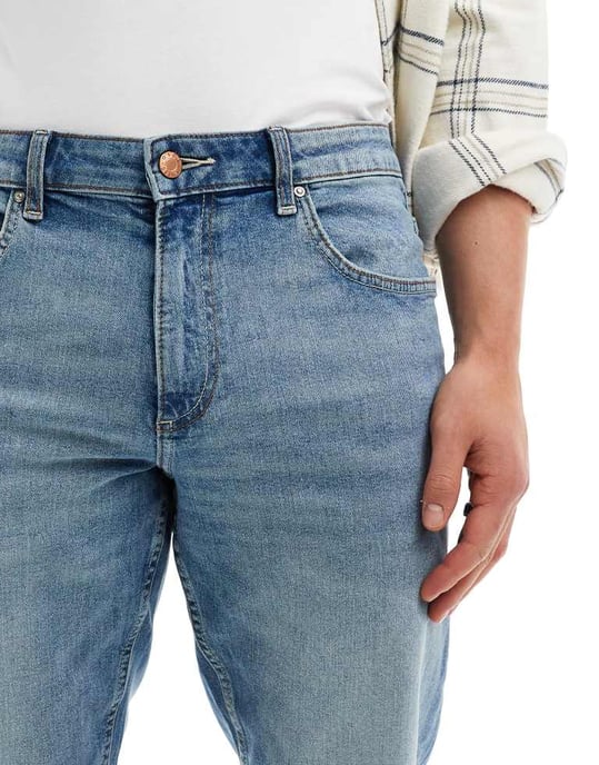 ASOS DESIGN – Blå stretchiga, avsmalnande jeans med mellanblå tvätt - Image 4