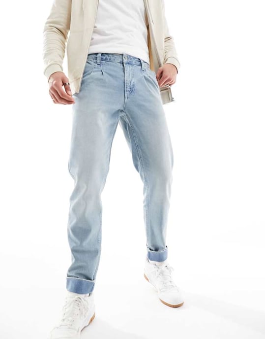 ASOS DESIGN – Mellanblå jeans med avsmalnande passform och uppvikta veck - Image 1