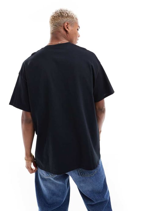 ASOS DESIGN – Svart oversized t-shirt med paraiso-tryck framtill - Image 3