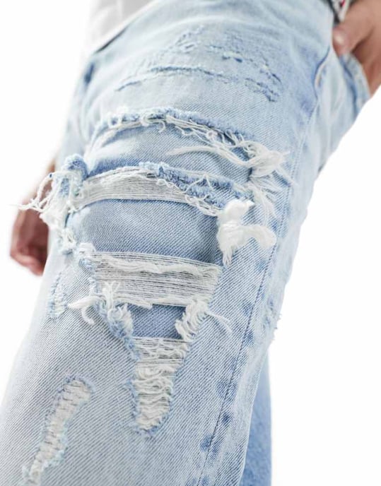 Tommy Jeans – Isaac – Ljustvättade avsmalnande jeans med slitning - Image 2