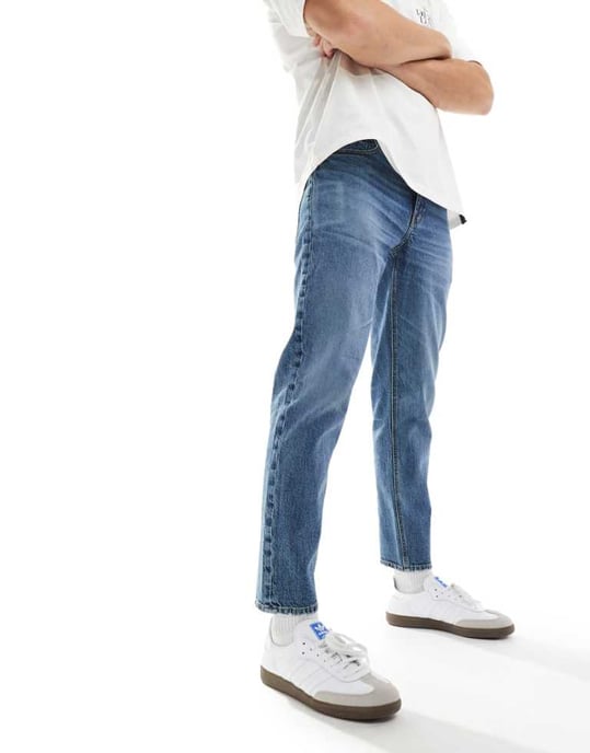 ASOS DESIGN – Blå stretchiga, avsmalnande jeans med mellanblå tvätt - Image 1