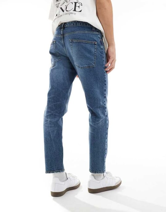ASOS DESIGN – Blå stretchiga, avsmalnande jeans med mellanblå tvätt - Image 2