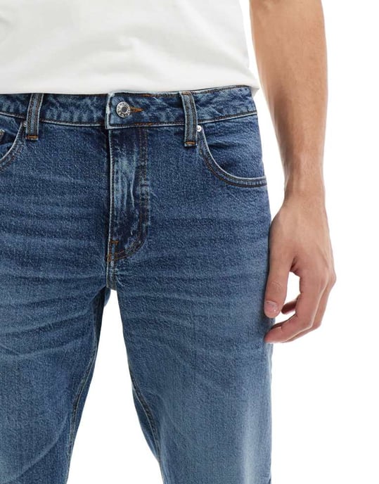 ASOS DESIGN – Blå stretchiga, avsmalnande jeans med mellanblå tvätt - Image 4