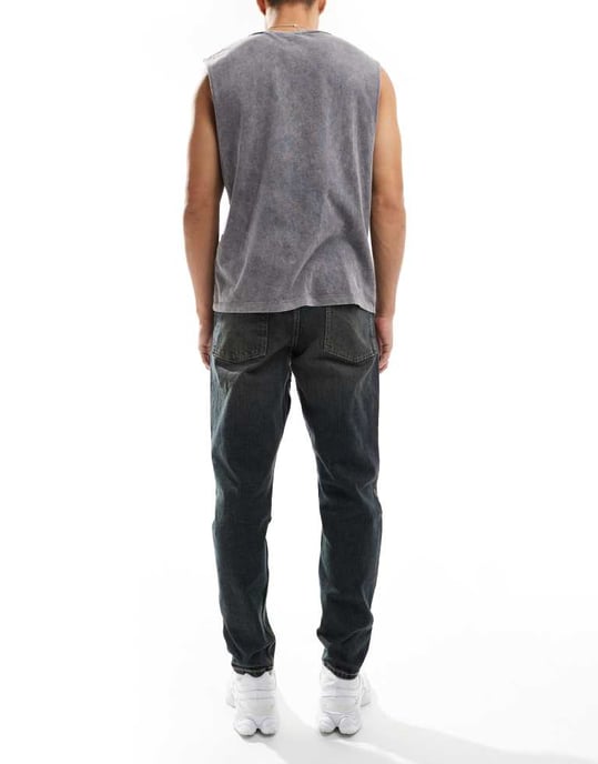 ASOS DESIGN – Mörkblå jeans med avsmalnande passform och nyans - Image 2