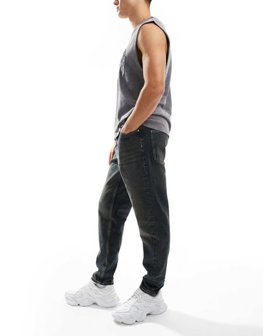 ASOS DESIGN – Mörkblå jeans med avsmalnande passform och nyans - Image 3