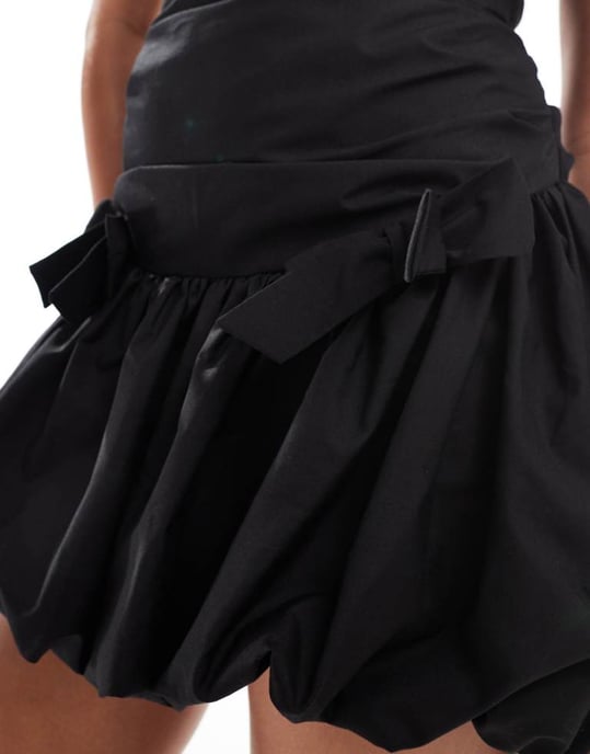 ASOS DESIGN ultimate bandeau mini puffball dress with bow skirt in black - Image 4