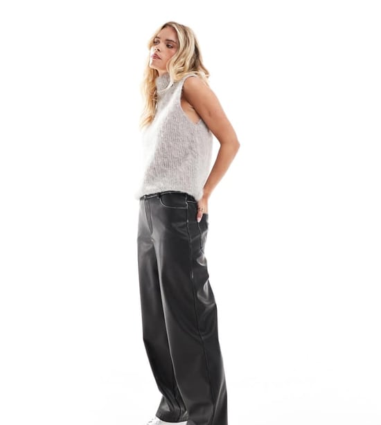 ASOS DESIGN Petite faux leather straight leg trousers in washed black - Image 1
