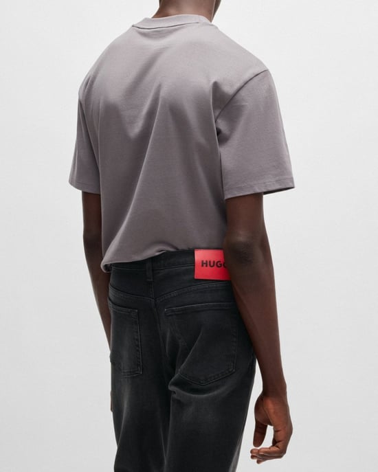 Tapered-Fit Stretch Jeans in Black - Image 2