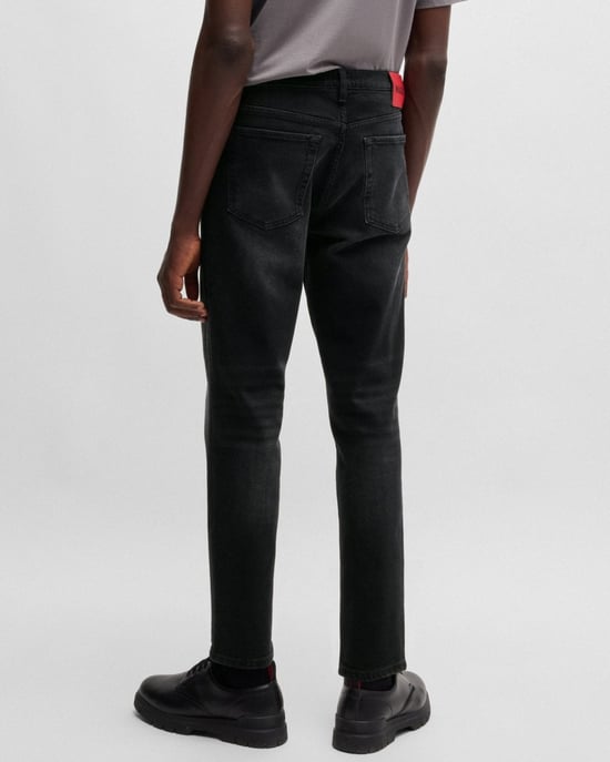Tapered-Fit Stretch Jeans in Black - Image 4