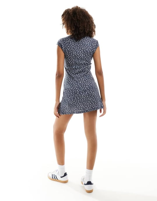 ASOS DESIGN scoop neck pointelle mini dress with bow detail in washed navy ditsy print - Image 3
