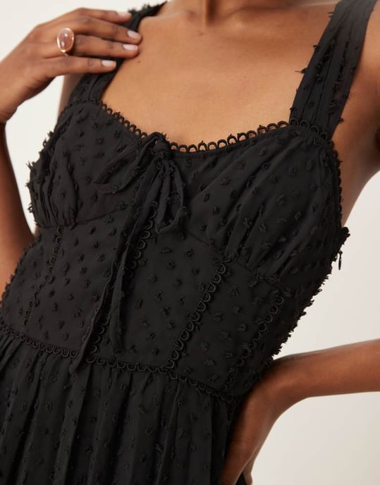ASOS DESIGN dobby milkmaid bust pleated mini dress in black - Image 4