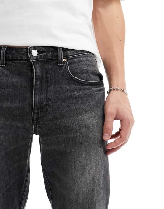 ASOS DESIGN stretch tapered jeans in washed black - Image 4
