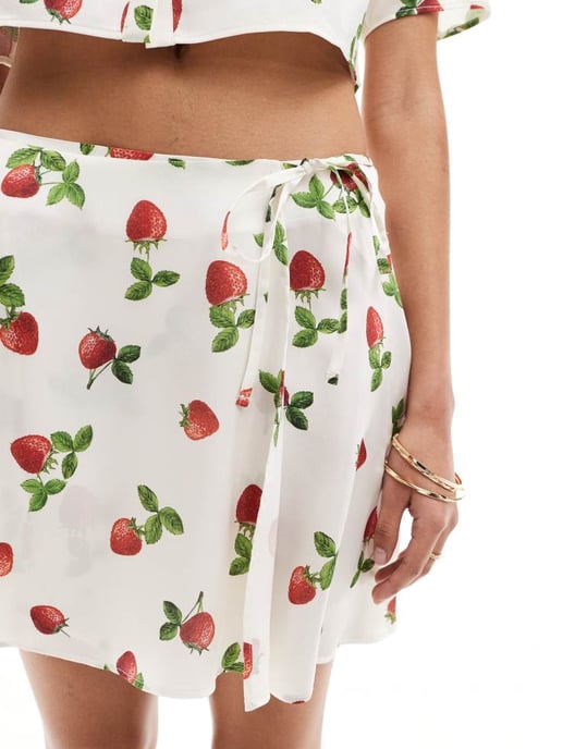 ASOS DESIGN satin wrap mini skirt in strawberry print co-ord - Image 4