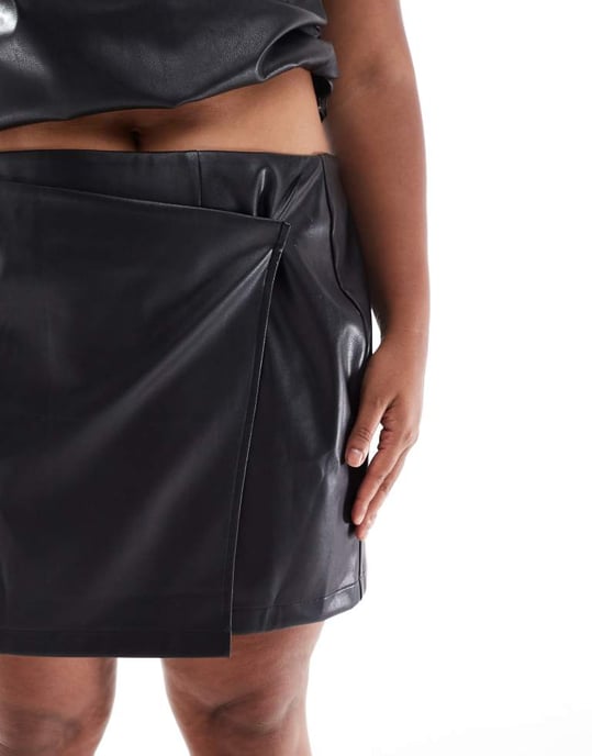 ASOS DESIGN Curve wrap front button leather look mini skirt in black - Image 3