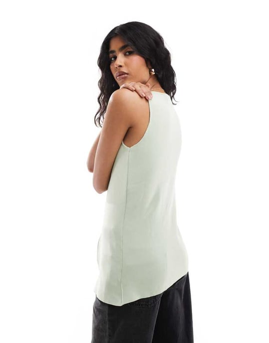 ASOS DESIGN stickad rundhalsad väst med frontslits i pistage - Image 2