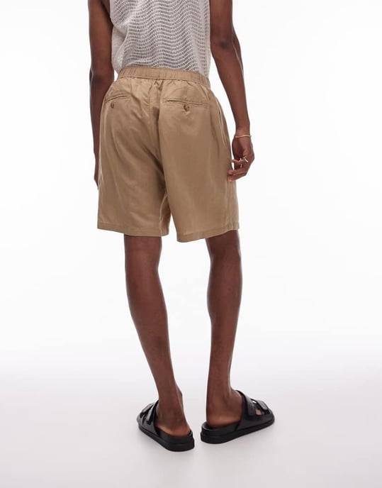 Topman samordnade linnebyxor i sten - Image 3