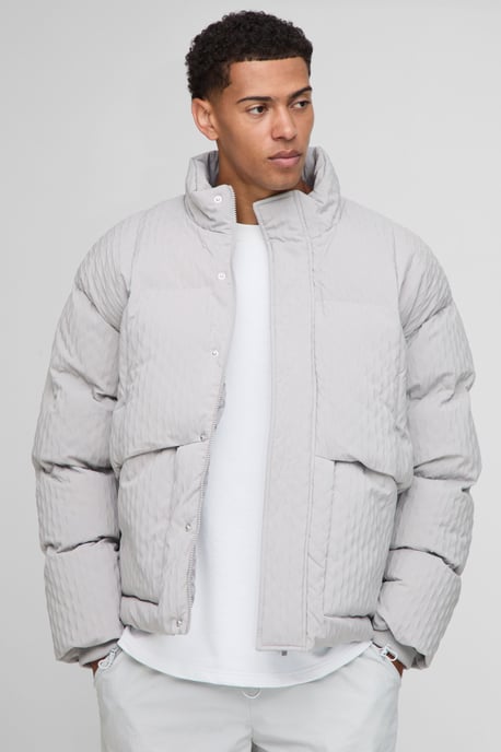 Oversized Fit Textured Funnel Neck Puffer Jacket - Image 1