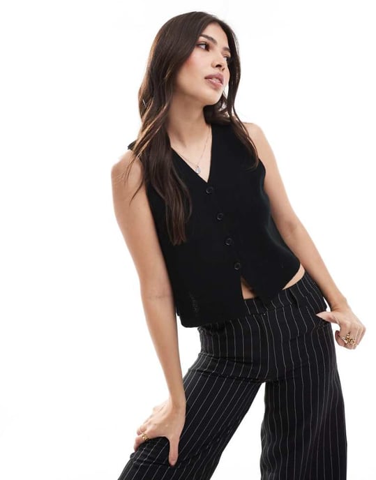 ASOS DESIGN knitted compact v neck waistcoat in black - Image 1